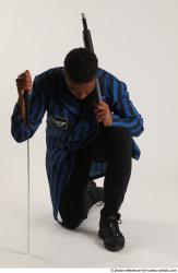 Garson KNEELING POSE WITH KATANA AND SHOTGUN